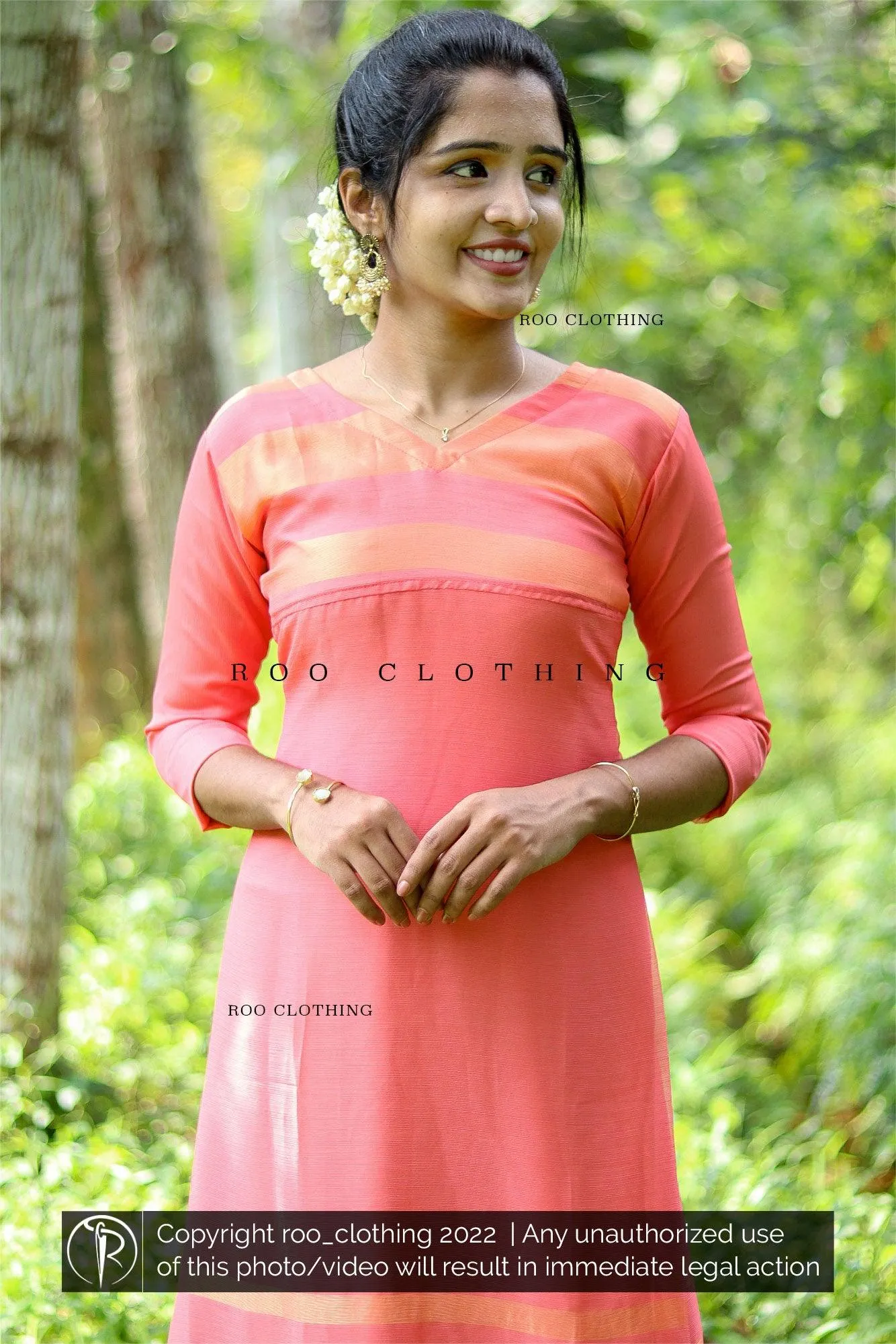 Peach chiffon dress with golden Kasavu border