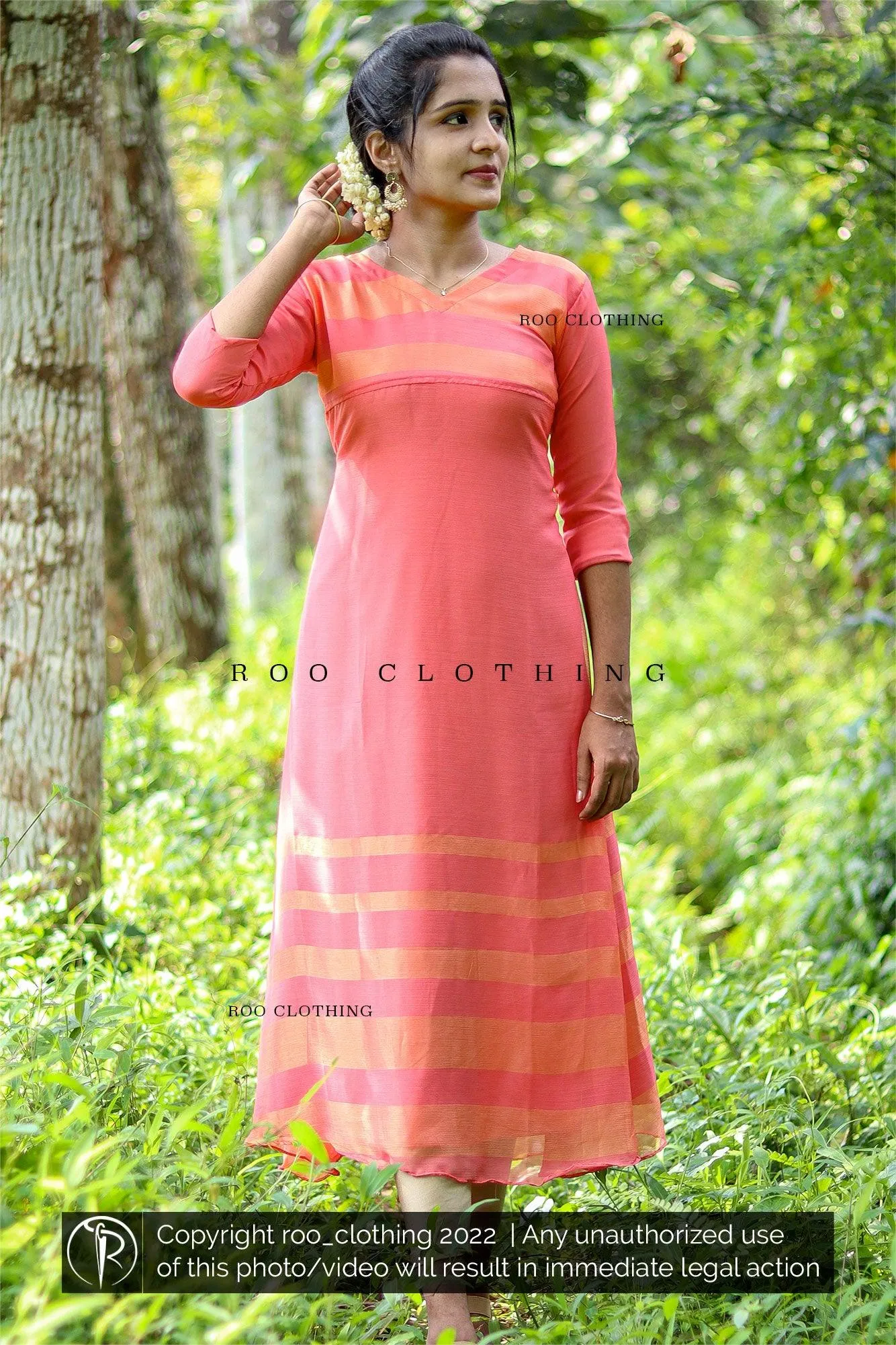 Peach chiffon dress with golden Kasavu border